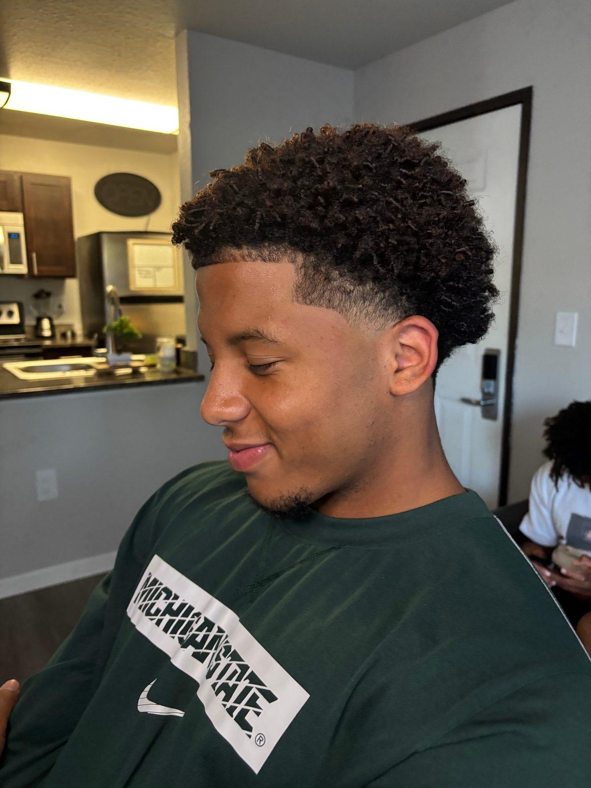 Fade haircut by Cuts by Scrap